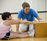 child working with instructor