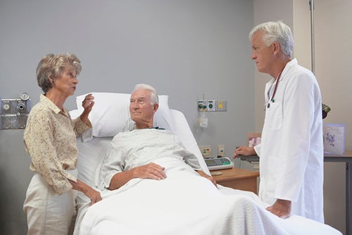 hospitalist talking with patient and his wife