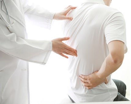 Man holding back pain