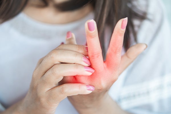 Woman with hand pain.