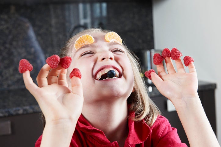 child playing with food 