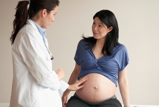 Pregnant woman in consultation