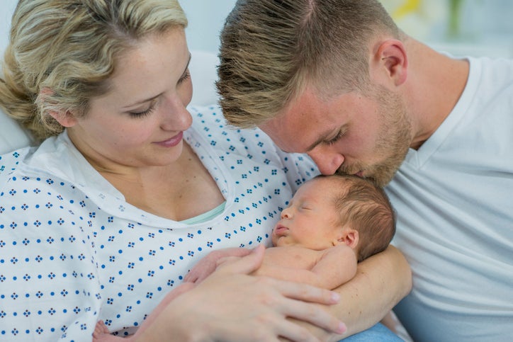 couple with newborn baby