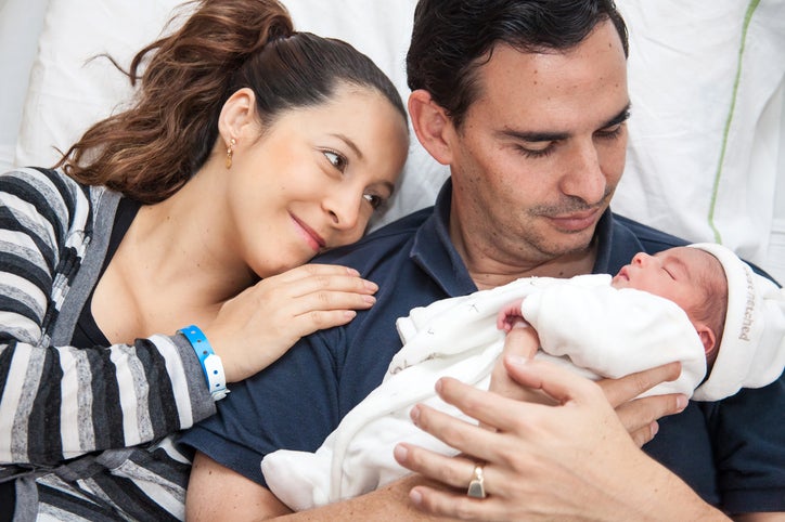 mom and dad with new baby