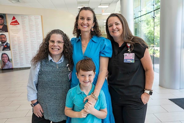 Dr. Carlucci, nurse, patient and mom