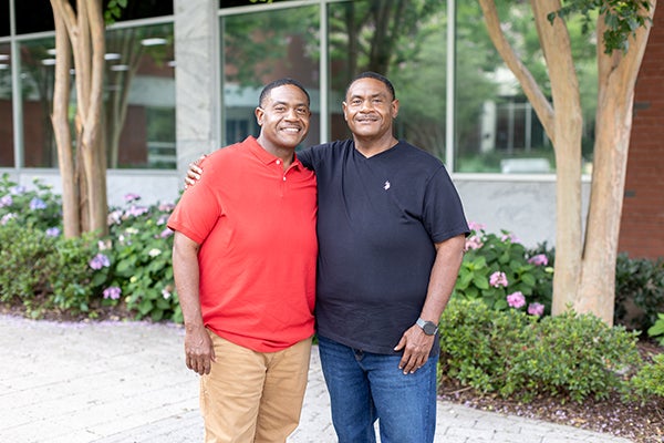 Elton and Shelton arms around each other