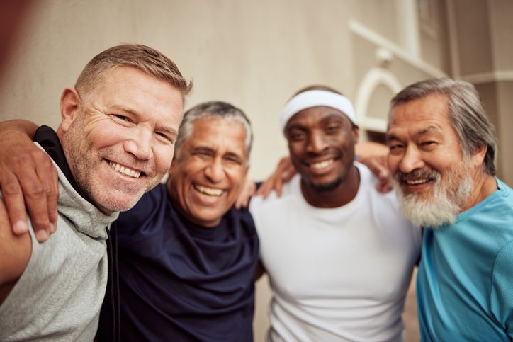 multiracial group of smiling men