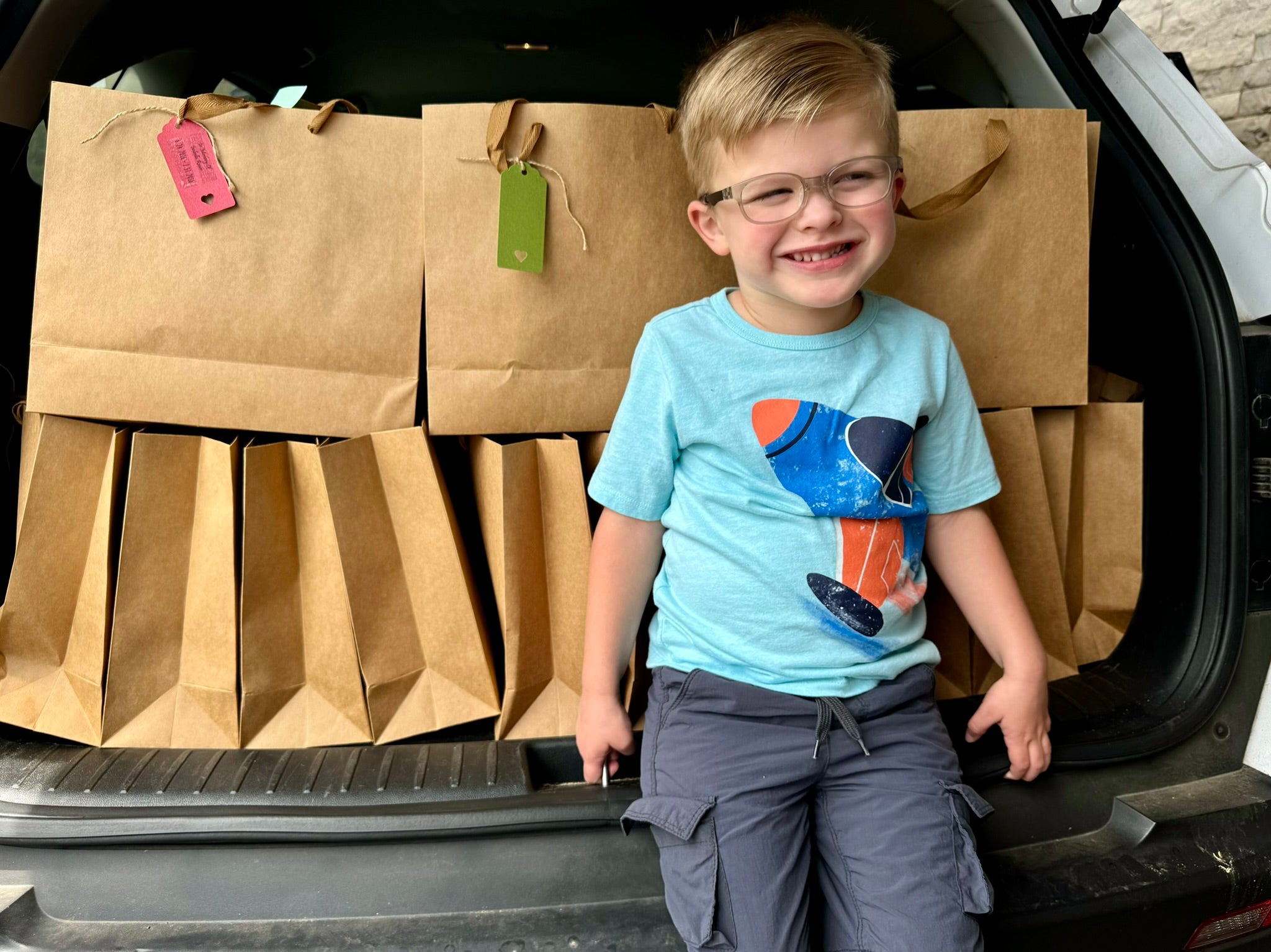little brother with Bella's Bags