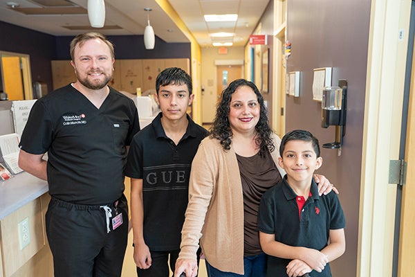 Dr. Muncie and the Guzman Family