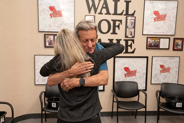Billy hugging therapist