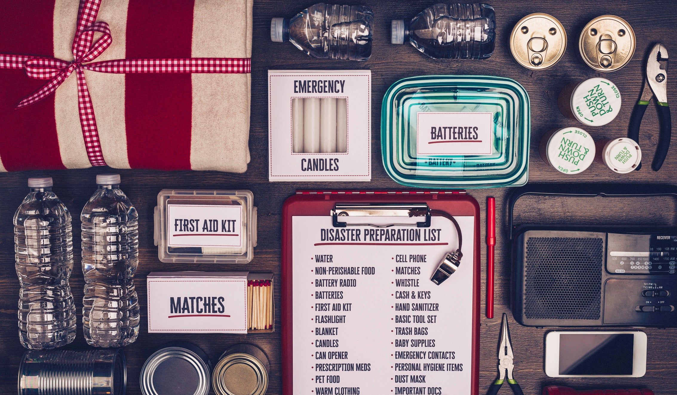 Disaster preparation kit flat lay. Items needed for disaster preparedness