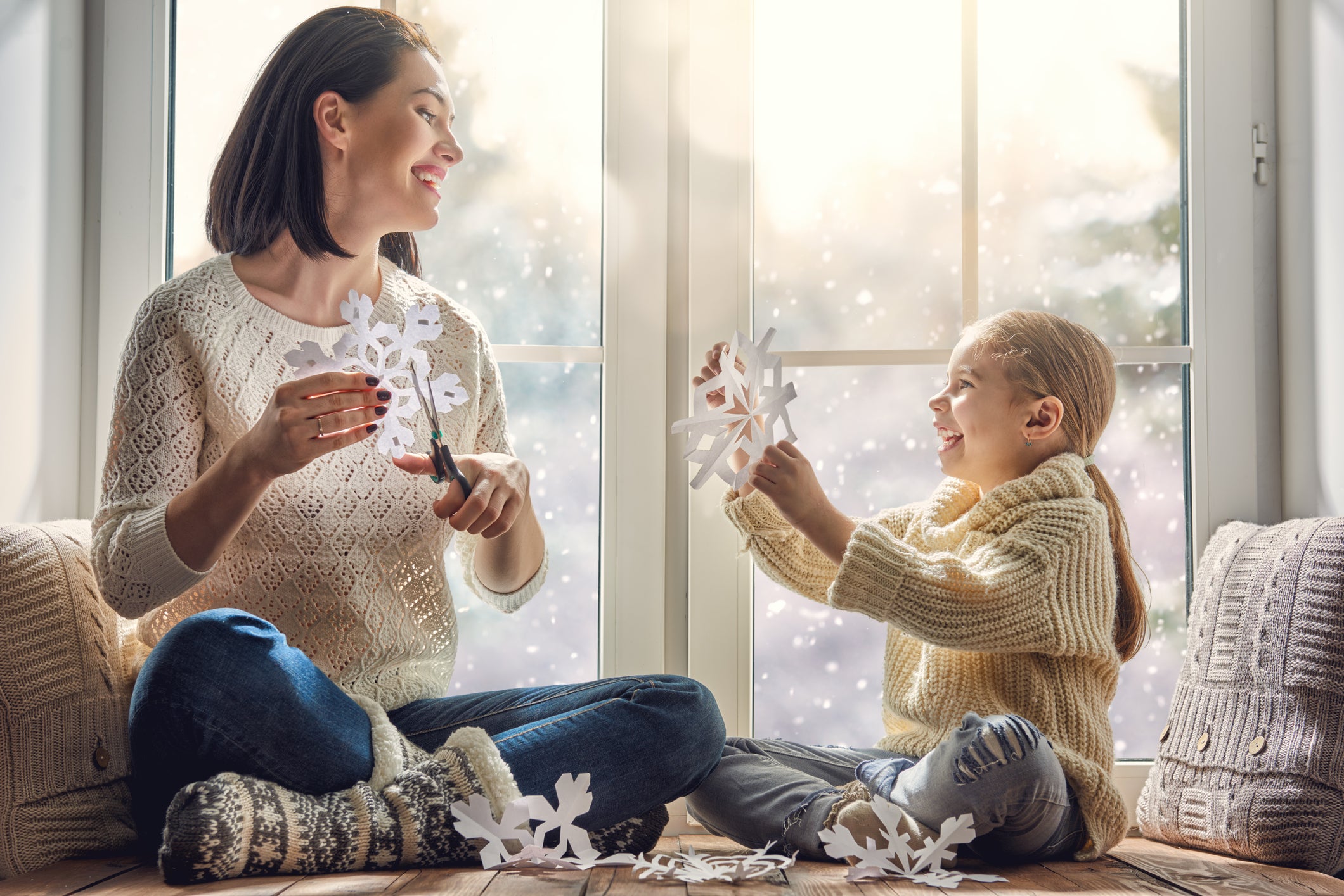 family sitting by the window