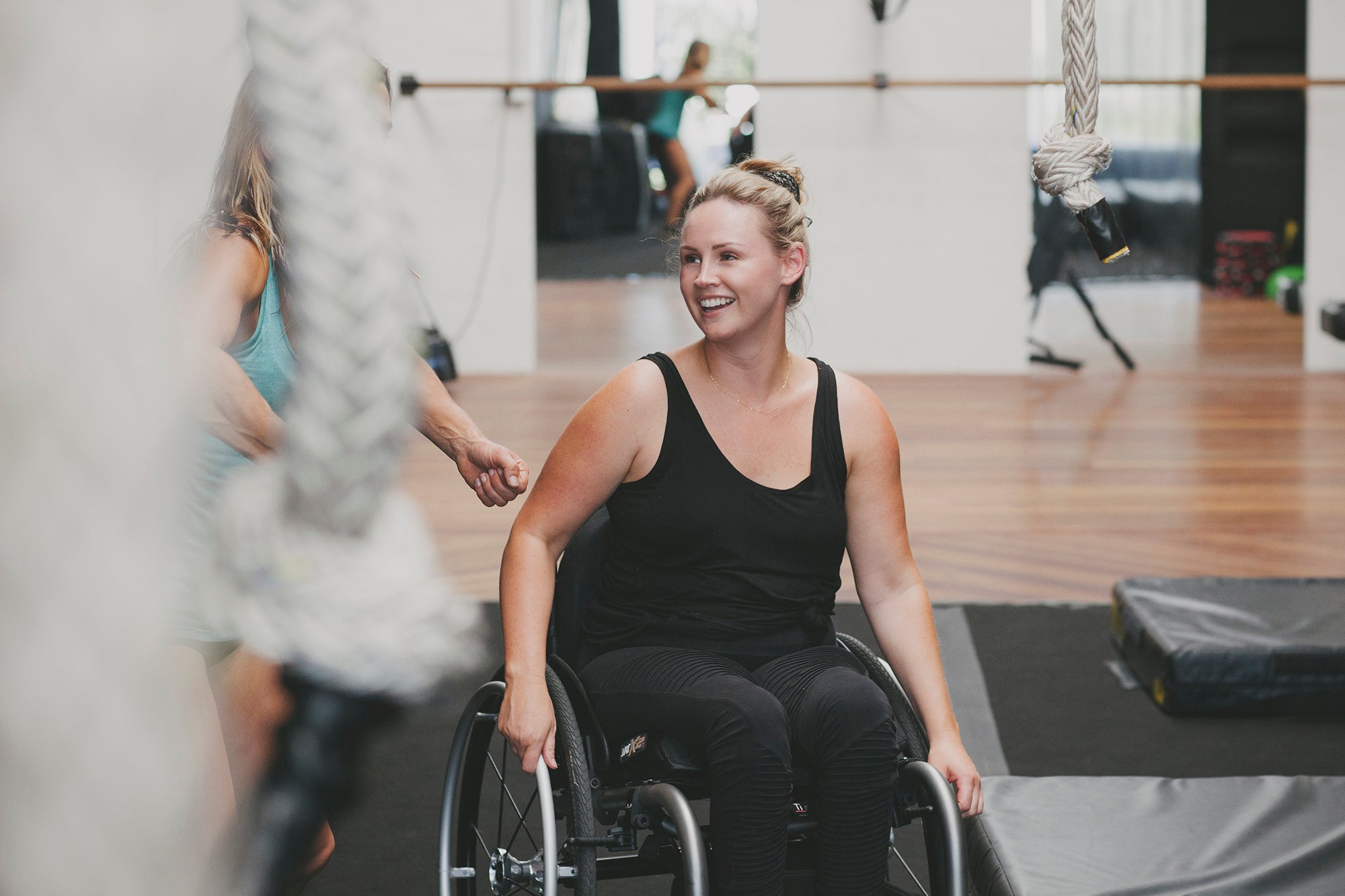 Paraplegic woman in a gym