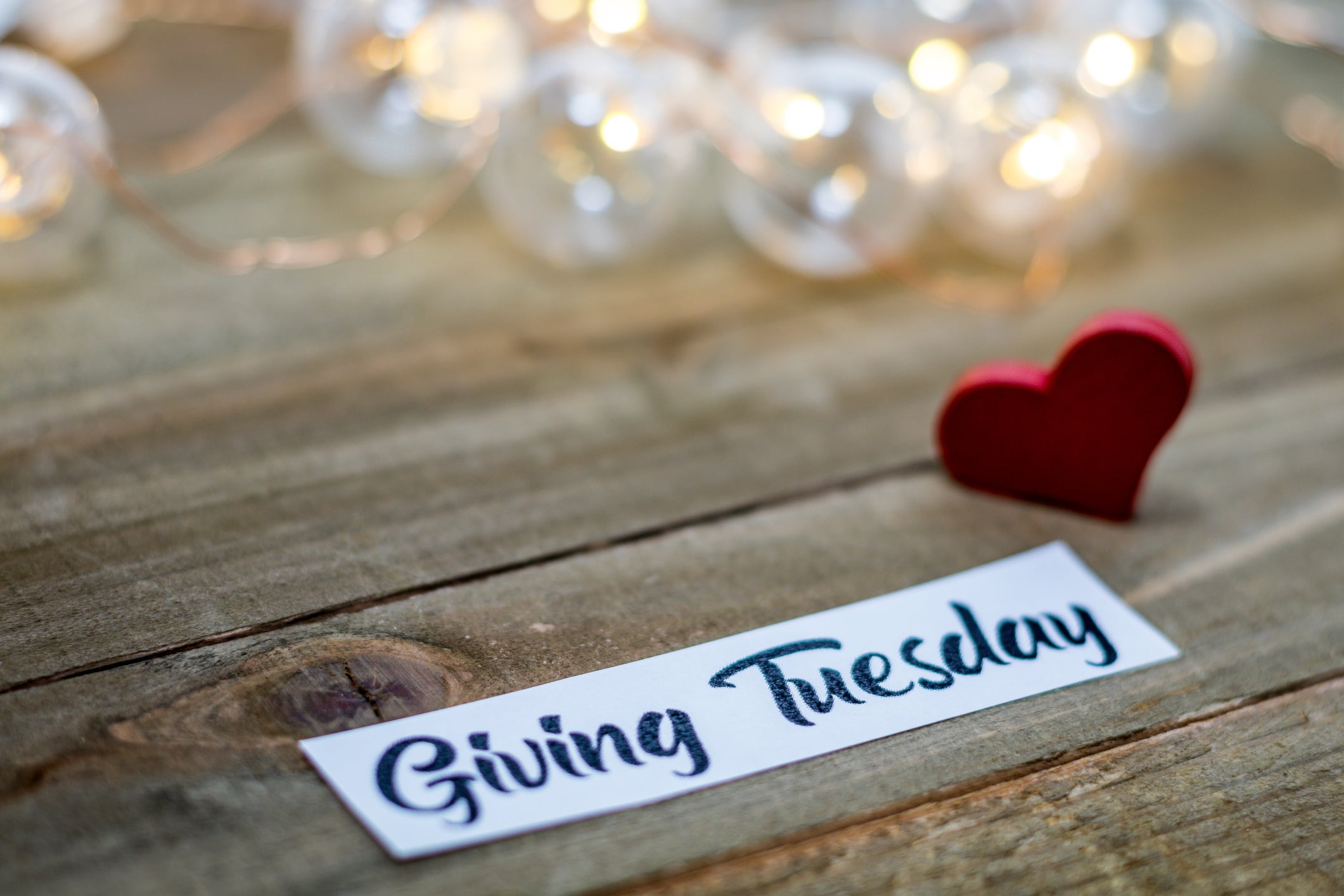 Giving Tuesday donate charity concept on wooden board