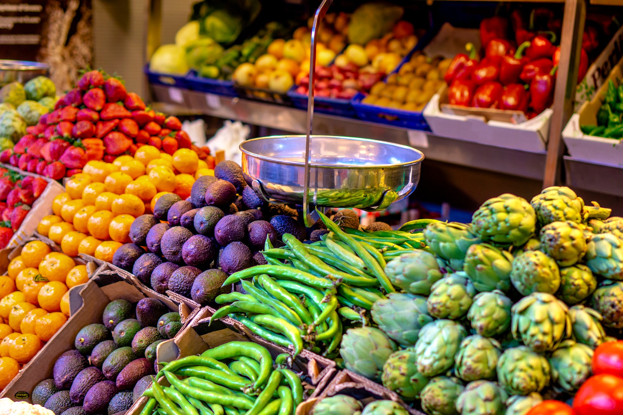 colorful fruits and vegetables in blocks with an scale on farmers market to sell fuits