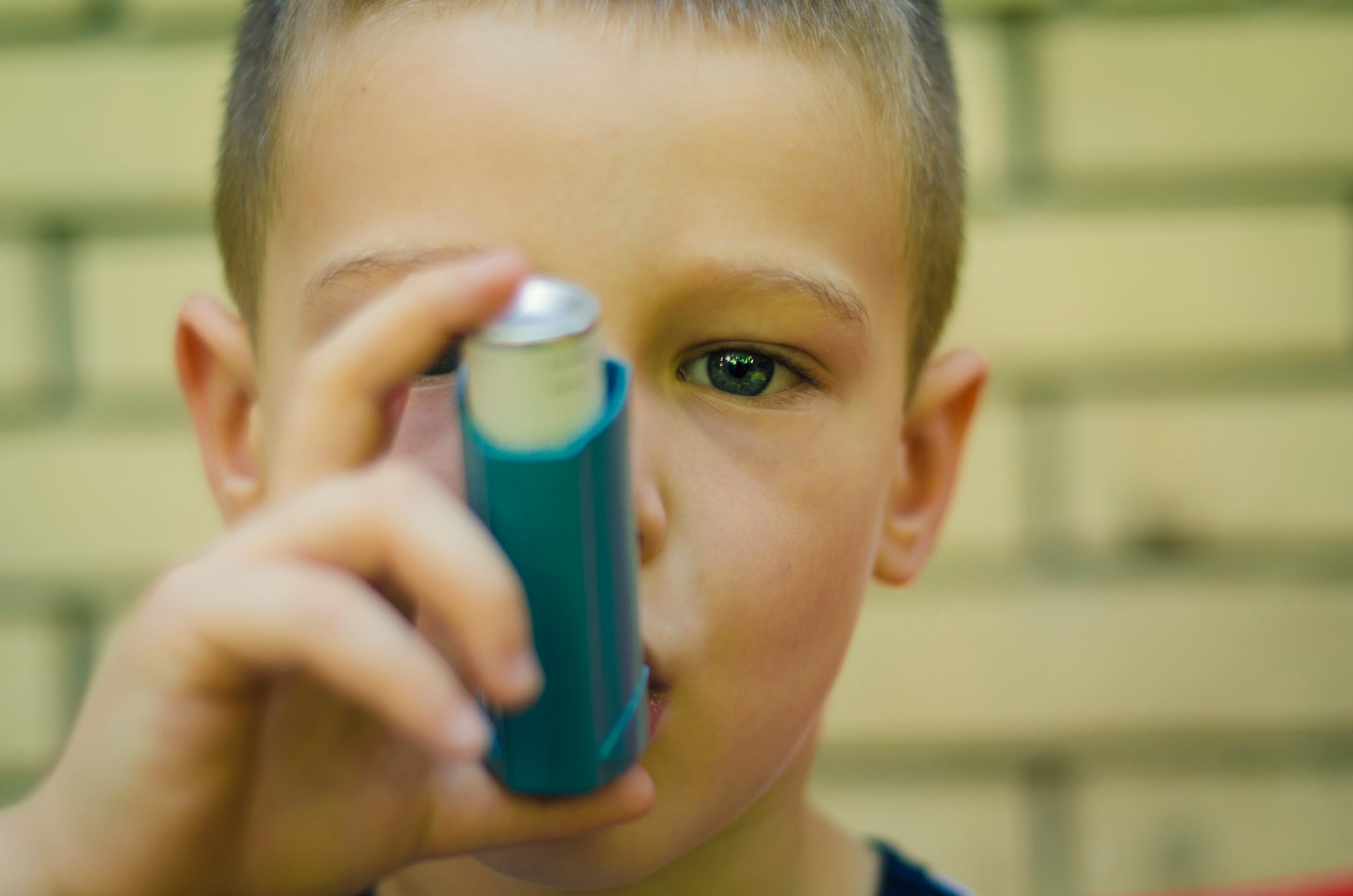 Kid using inhaler