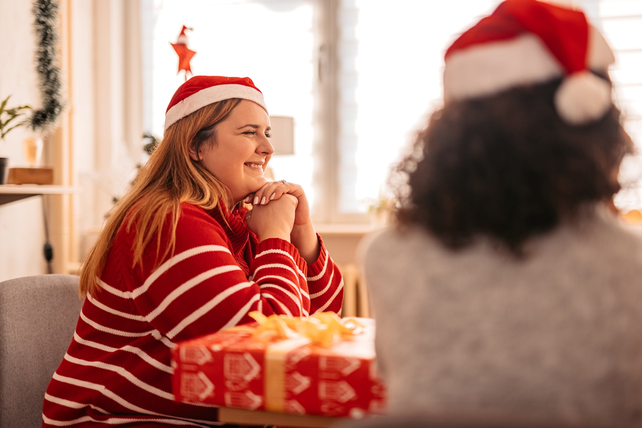 Smiling woman enjoying at Christmas party