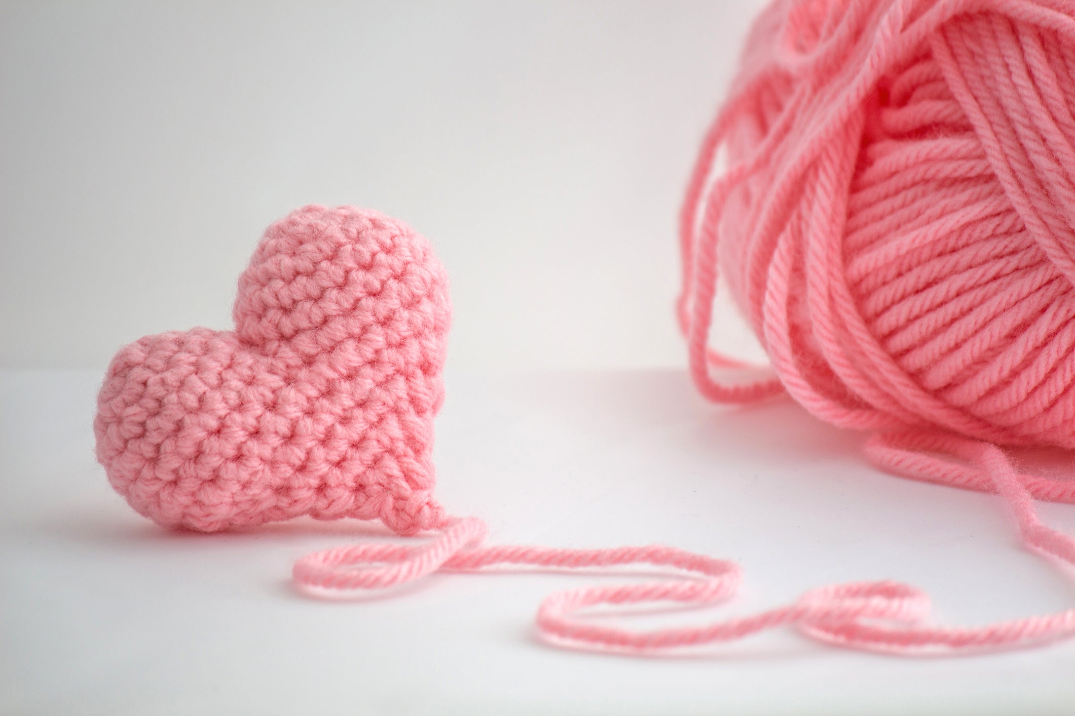 Pink Crochet Heart and a Skein of Yarn