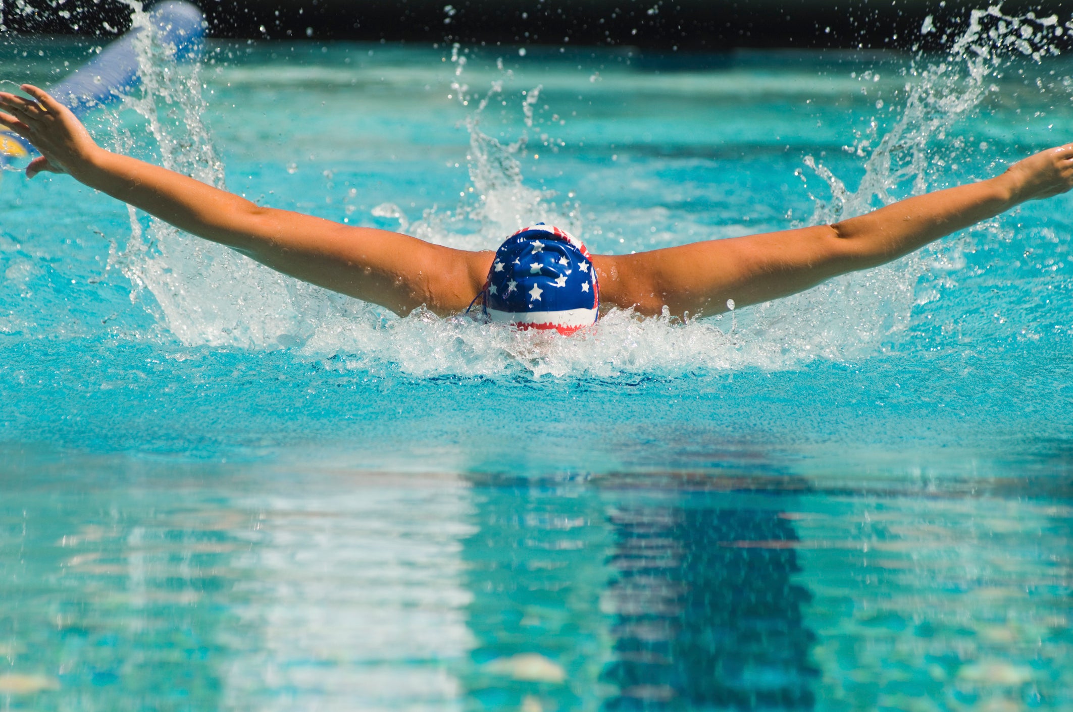 Woman Swimming Butterfly Stroke