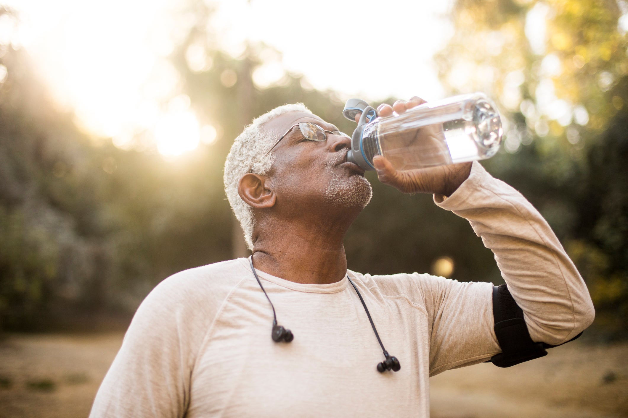 Senior African American Man Drinking Water