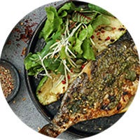 Herbed Mediterranean Fish with Wilted Greens