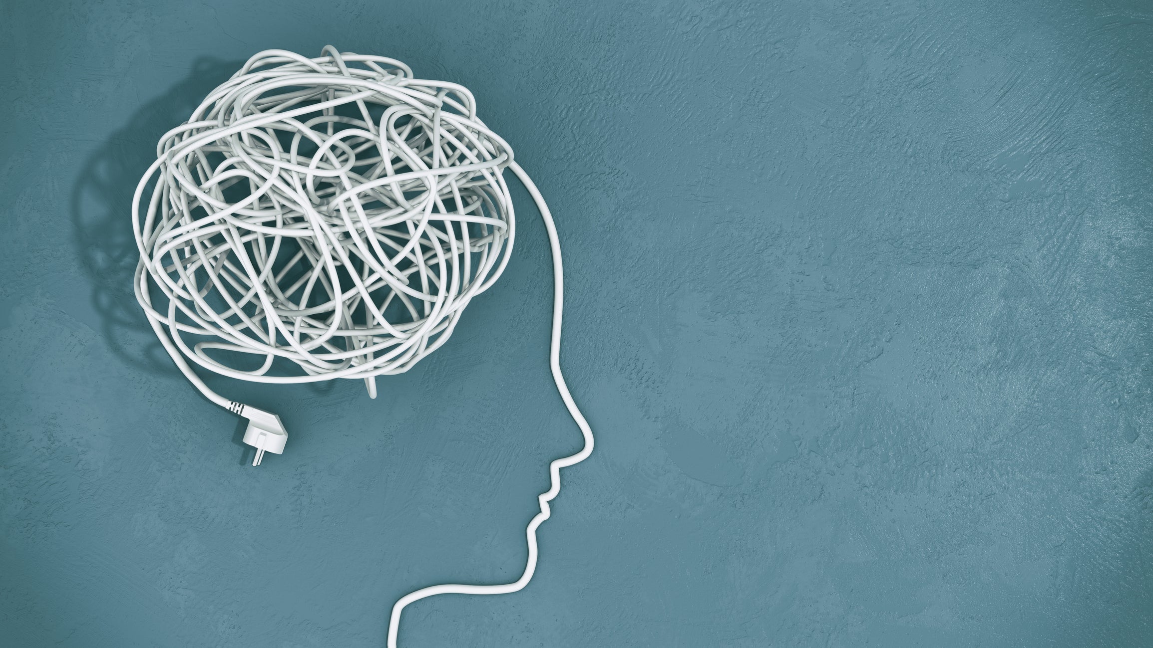 Human head with tangled wires