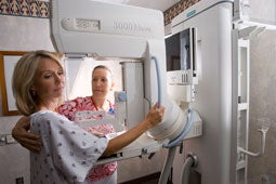 patient getting mammogram