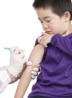 pediatric patient getting a shot