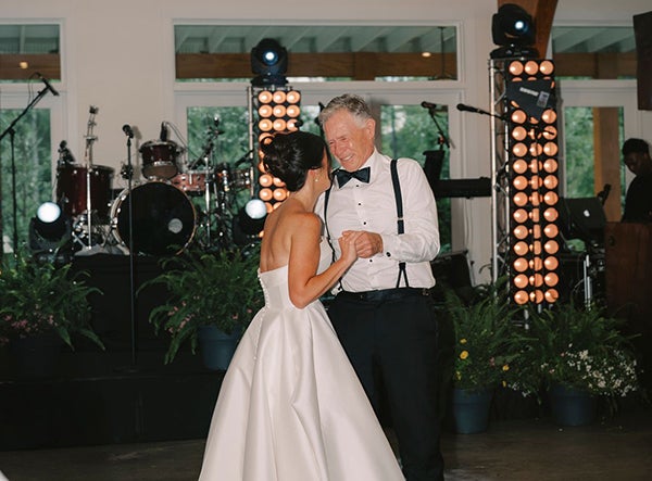 Sarah dancing with her dad
