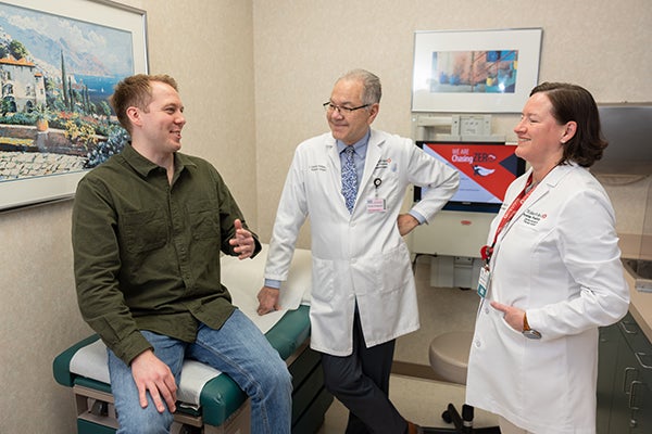 Ben talking to doctors