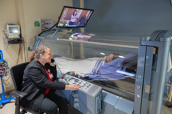 patient in hyperbaric chamber