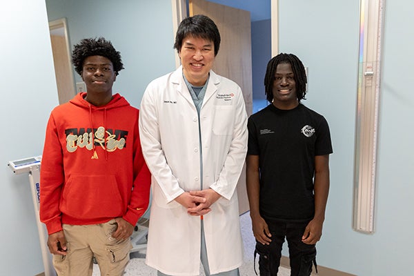 Brothers with Dr. Ho
