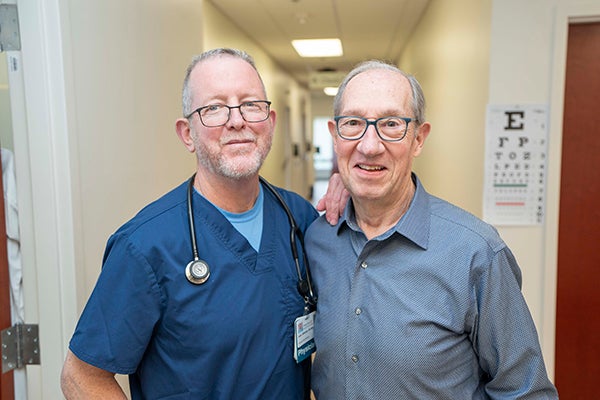 Dr. Whelan smiling with patient