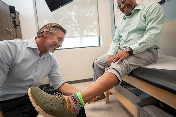 Dr. Ruffolo inspecting Jairo's leg