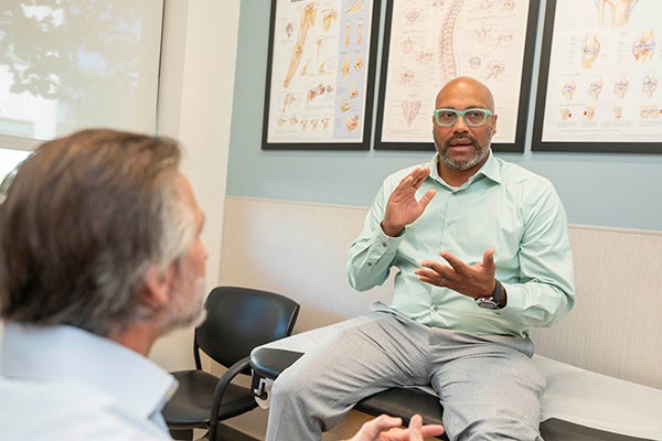 Jairo talking to Dr. Ruffolo