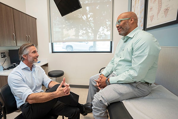 Jairo and Dr. Ruffolo chatting