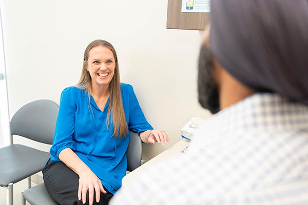 Michelle consulting with Dr. Sidhu