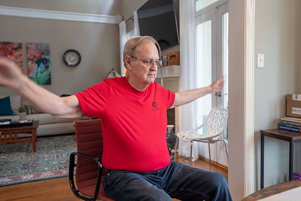 George doing arm workouts