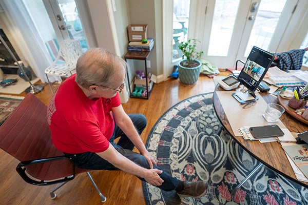 George working out with teacher