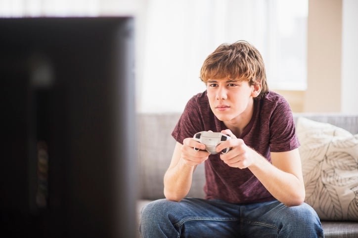 teen playing video games
