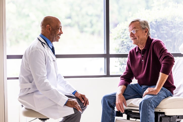 doctor with geriatric patient