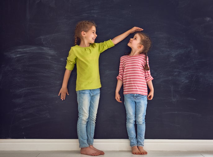 children comparing height