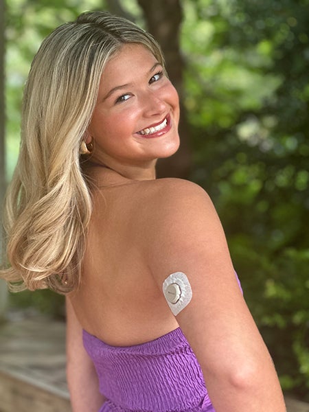 analee wearing diabetic monitor