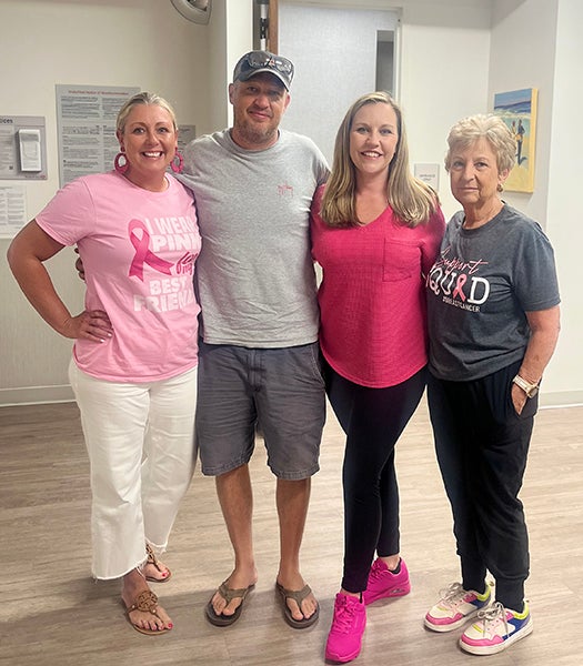 Blair and mom and husband and friend