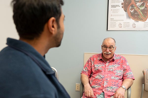 Lee consulting with Dr. Patel