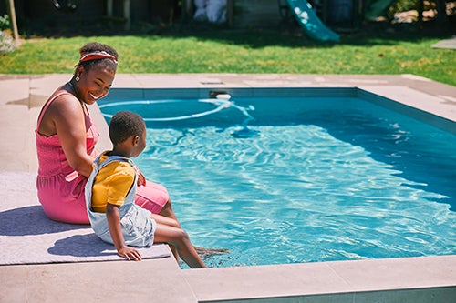 mom and son at pool